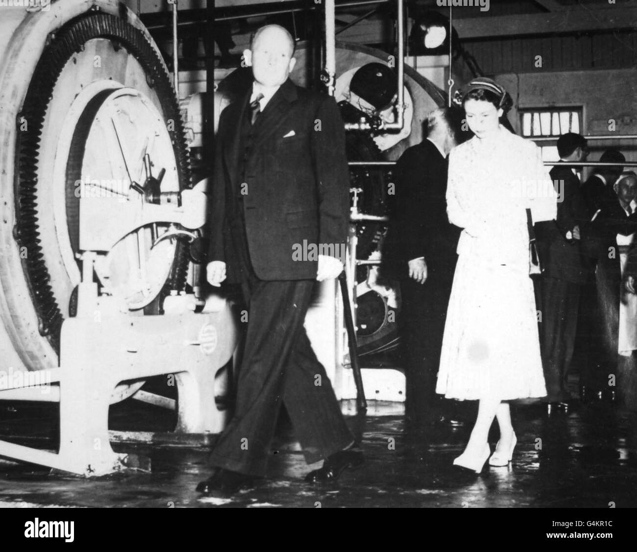 The Queen walks through the Bell Block CoOperative Dairy Factory