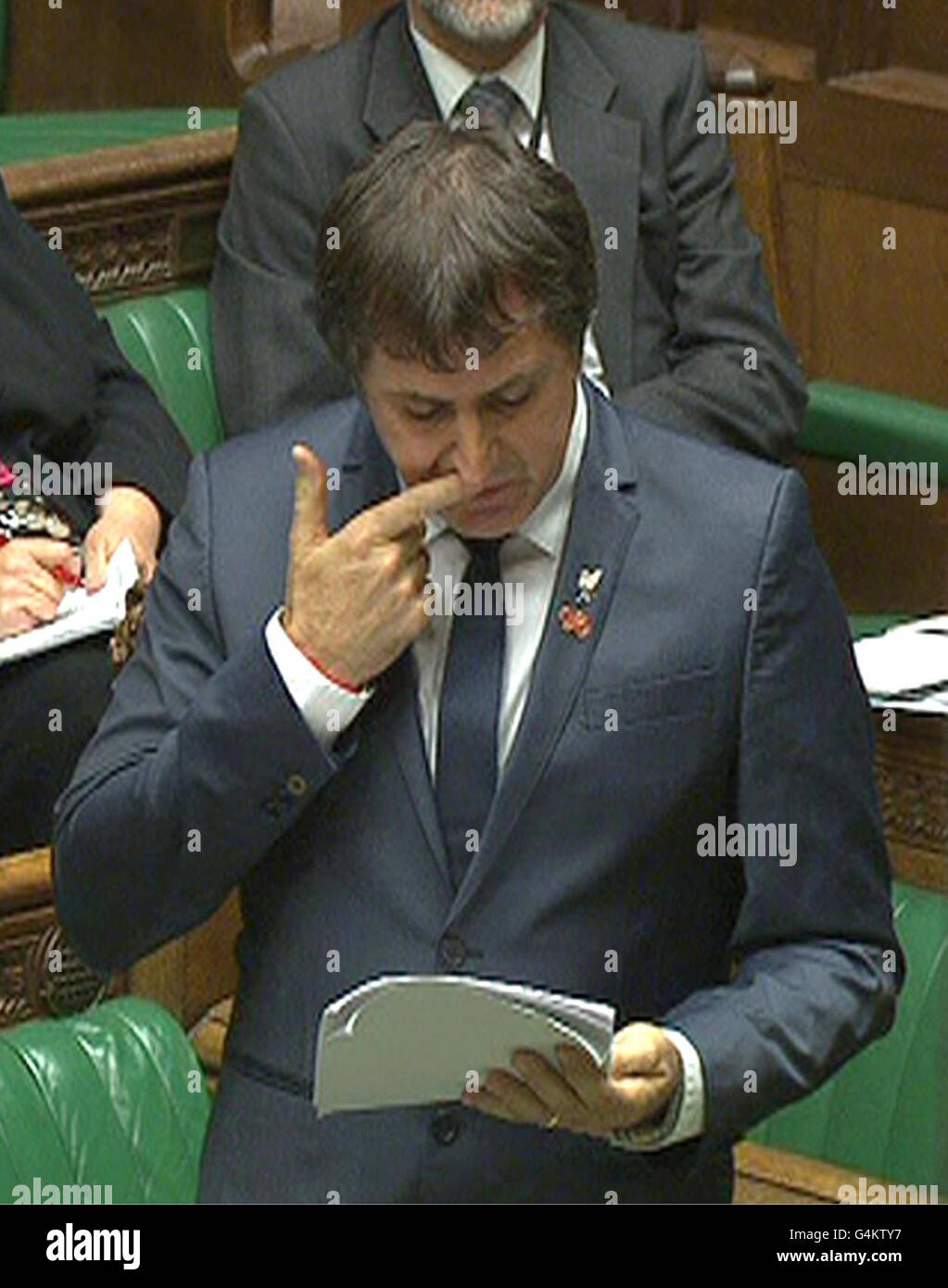 Liverpool Walton MP Steve Rotheram reads victims' names during a parliamentary debate on the 1989 Hillsborough disaster which claimed the lives of 96 Liverpool fans. Stock Photo