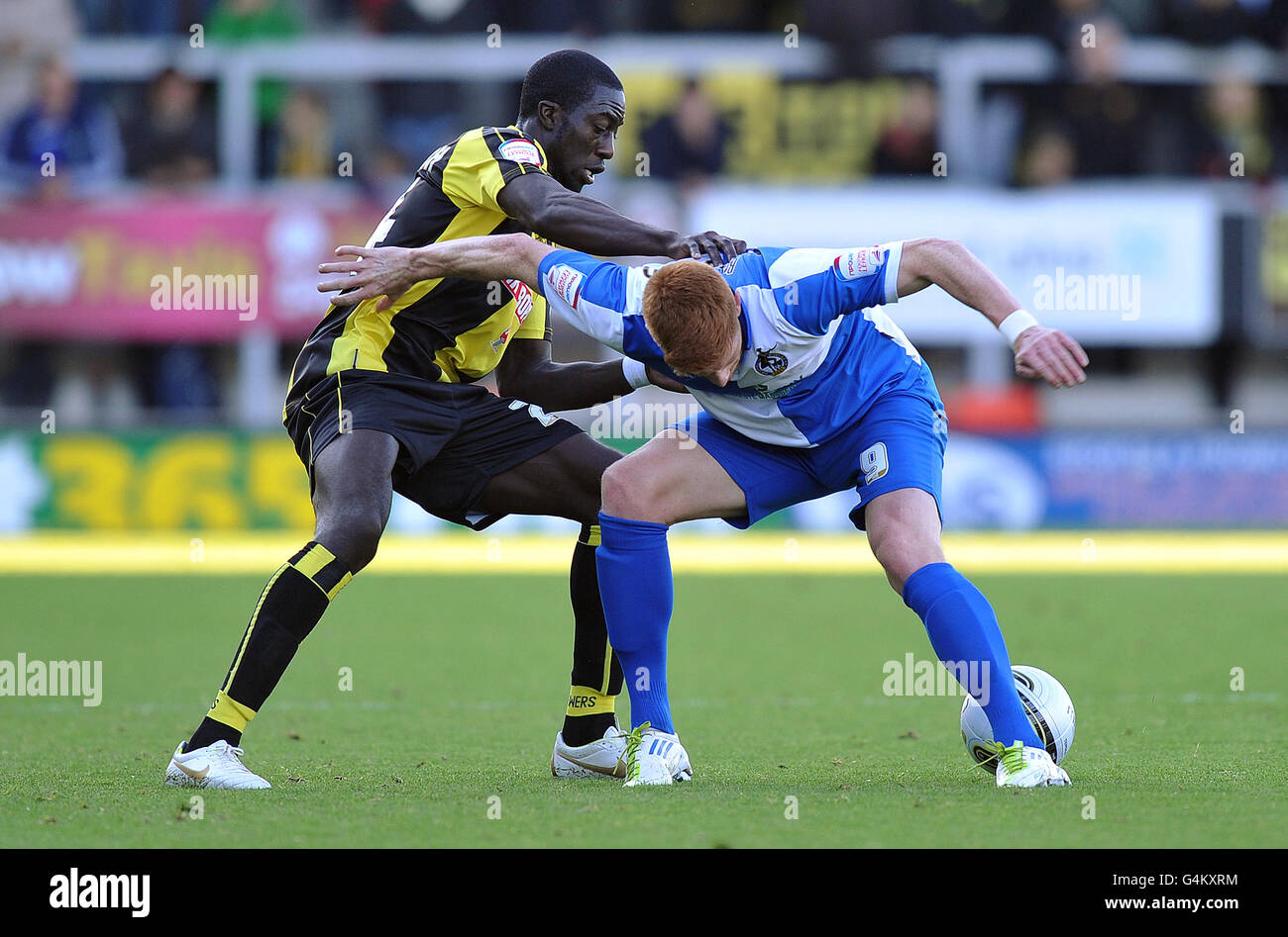 Burton Albion s Calvin Zola and Bristol Rovers Matt Harrold