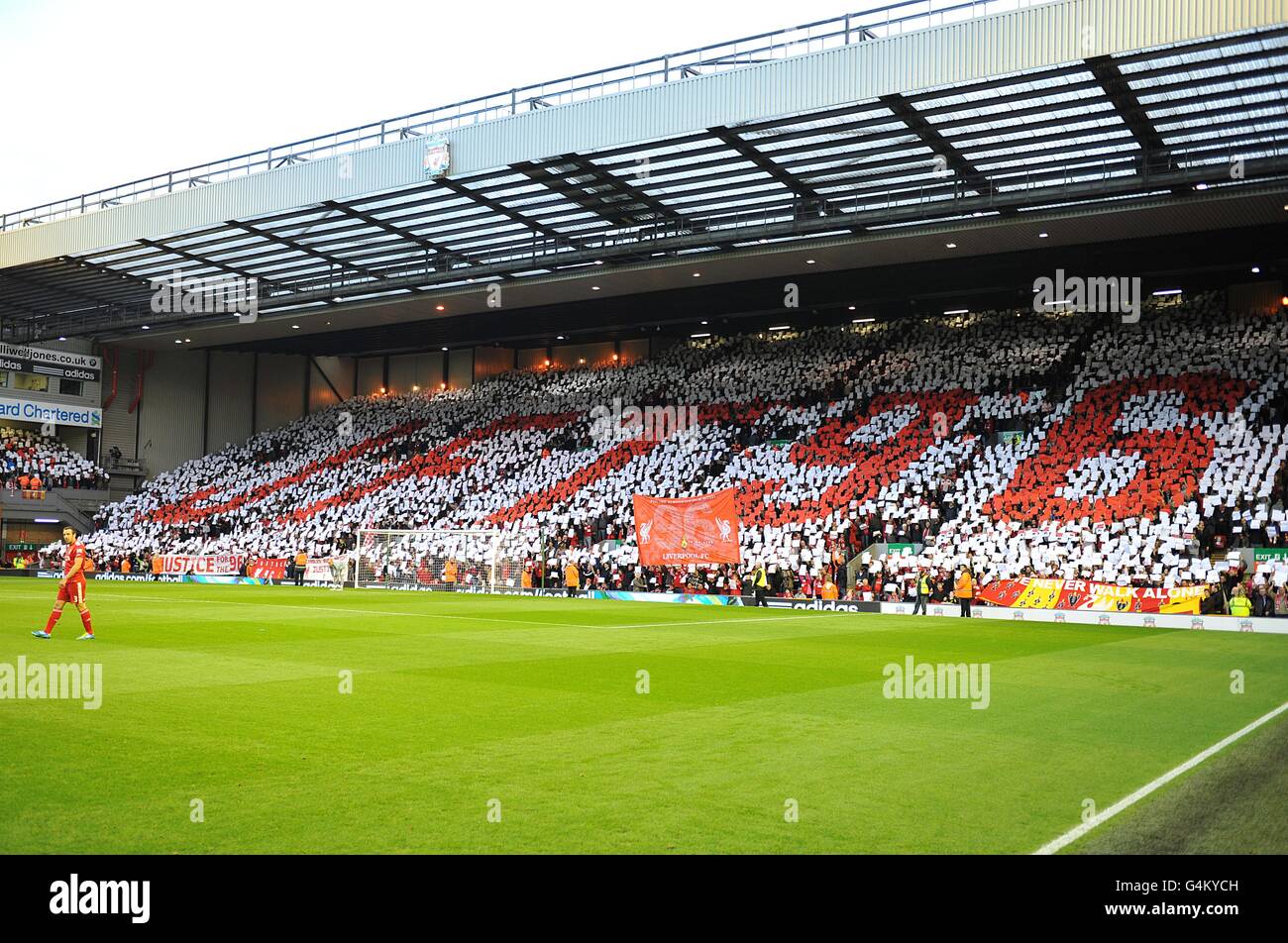 Fans in the stands hold up coloured cards in the stands to read JFT 96, in regards to the Hillsborough tragedy Stock Photo