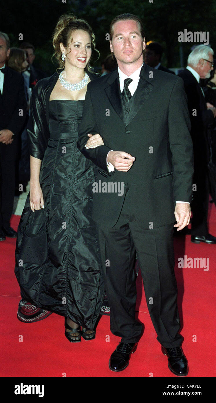 Actor Val Kilmer with his wife Jacy Gossett arrive for the sixth annual Cinema Against AIDS gala dinner and auction at Roger Verge's famed 'Le Moulin de Mougins' restaurant, during the 52nd Annual International Cannes Film Festival. Stock Photo