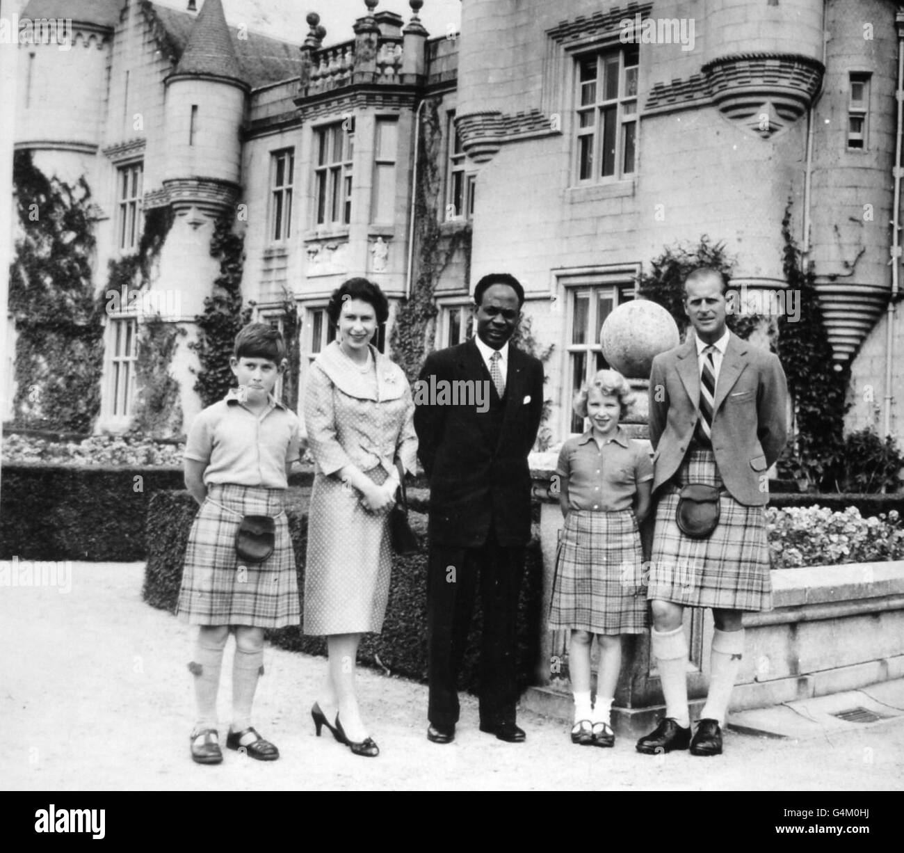Dr. Kwame Nkrumah, Prime Minister of Ghana, with Queen Elizabeth II, Duke of Edinburgh, Prince Charles and Princess Anne, at Balmoral Castle. Stock Photo