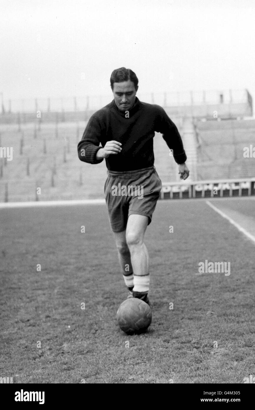Denis Compton. Footballer and England cricketer Denis Compton trains at Highbury Stadium in London, the home ground of Arsenal FC. Stock Photo