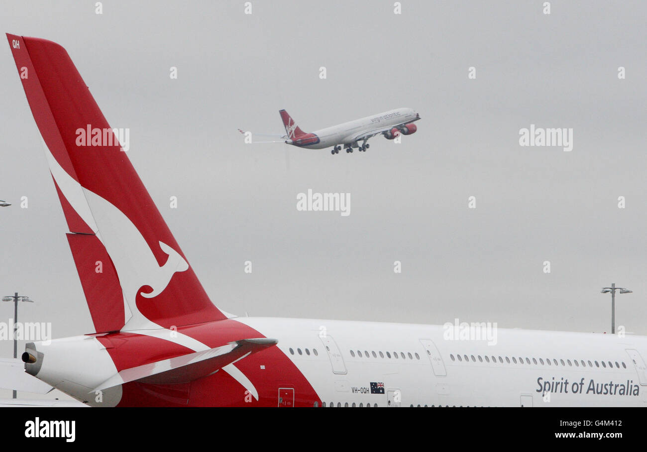 A Qantas plane sits on the tarmac at Heathrow Airport, as stranded British passengers were waiting to find out today if emergency talks would end their misery, after an industrial dispute left hundreds of flights grounded. Stock Photo