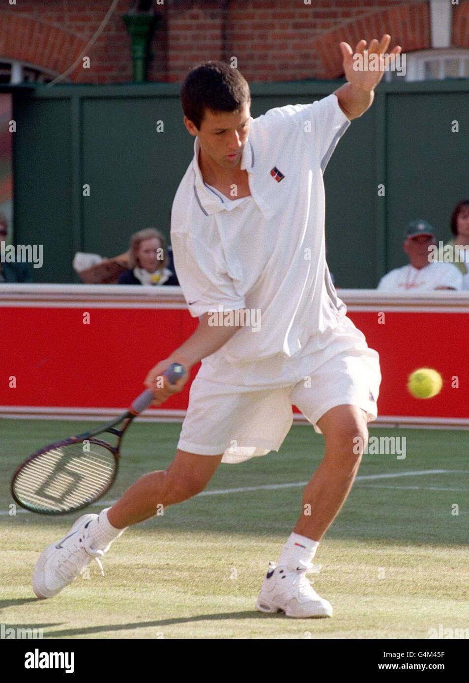 American Paul Goldstein in action in his match against Briton Greg Rusedski  in the Stella Artois Championship at Queen's Club in London Stock Photo -  Alamy