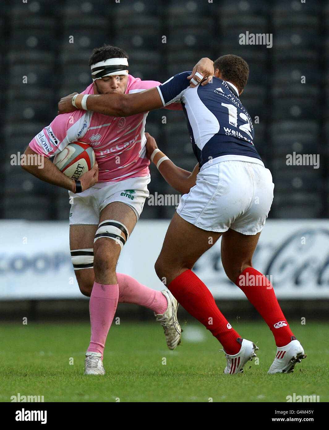 Nottingham Rugby's Michael Holford is tackled by London Scottish's Guy Armitage Stock Photo