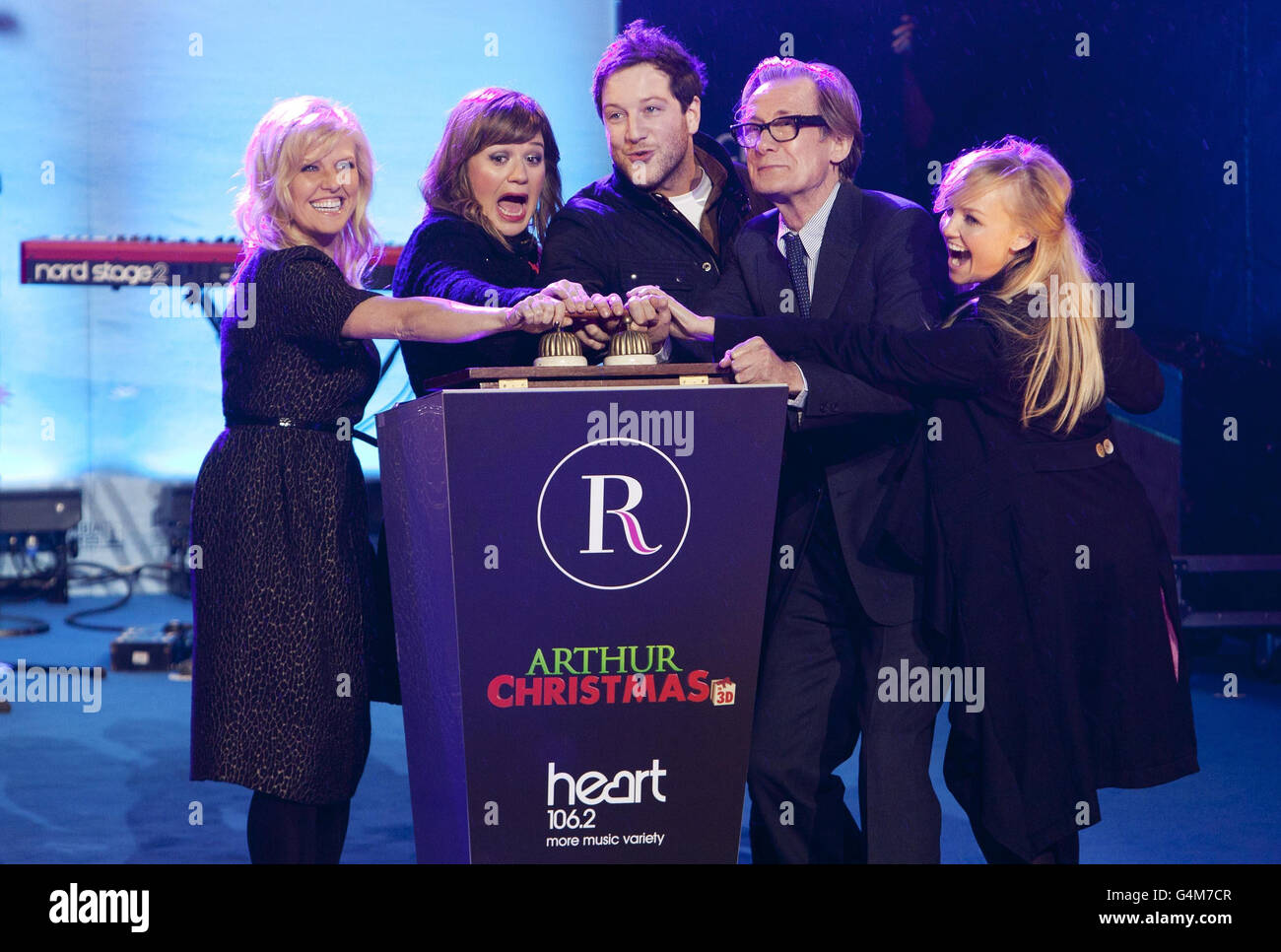 Bill Nighy and Ashley Jensen from the new 3D film Arthur Christmas with help from Kelly Clarkson, Matt Cardle and Emma Bunton turns on the the Regent Street Christmas Lights in central London. Stock Photo