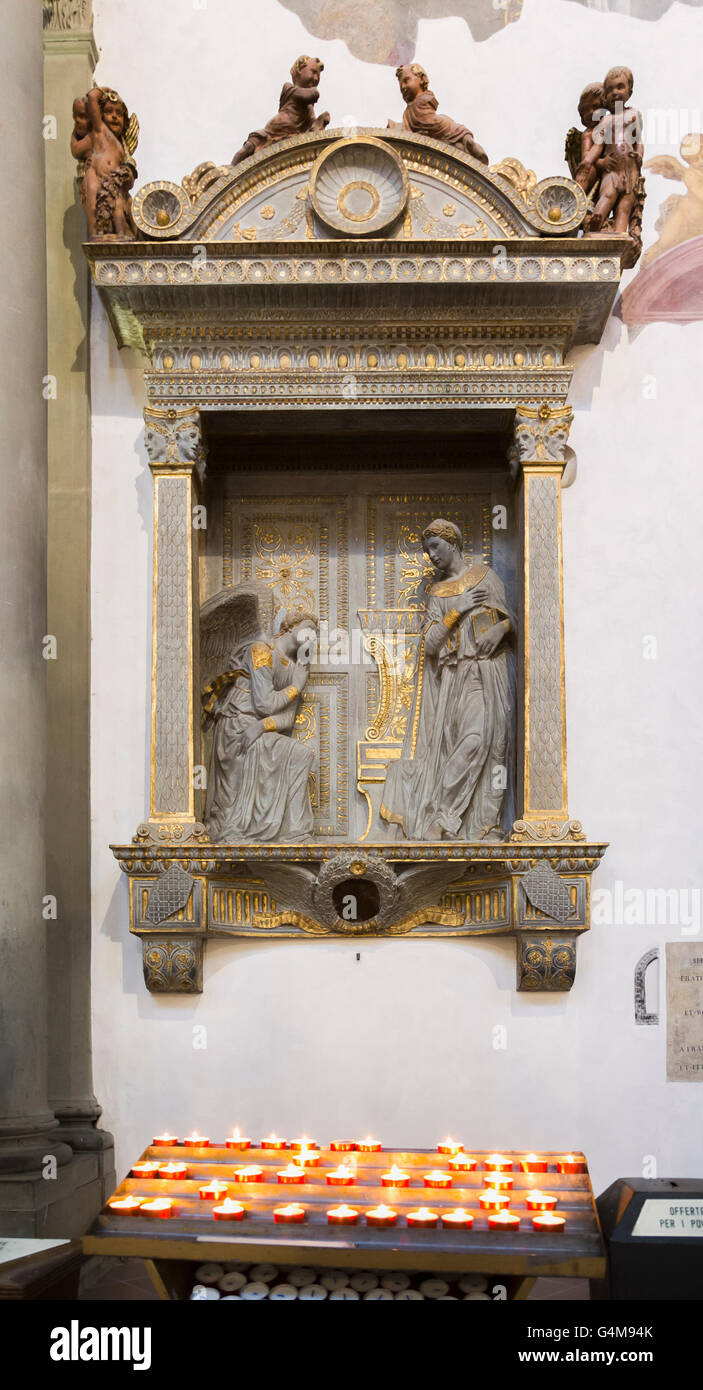Florence, Tuscany, Italy.  Santa Croce Basilica.  The Virgin and the Angel by Donatello. Stock Photo