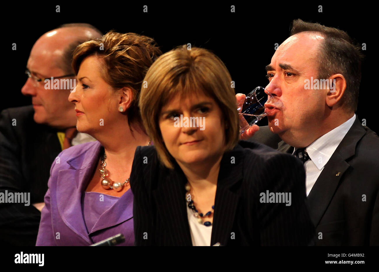 SNP Leader Alex Salmond (right) with Deputy Leader Nicola Sturgeon (2nd right), Finance Secretary John Swinney(left) and Fiona Hyslop Cabinet Secretary for Culture and External Affairs after speaking to delegates at the 77th Scottish National Party annual conference being held at the Eden Court Theatre in Inverness. Stock Photo