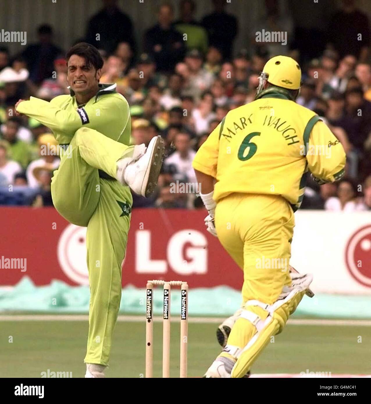 Shoaib Akhtar (left) the Pakistan fast bowler shows his anger as he kicks out at Australia's Mark Waugh during the World Cup Cricket 1999 Match at Headingley. Stock Photo
