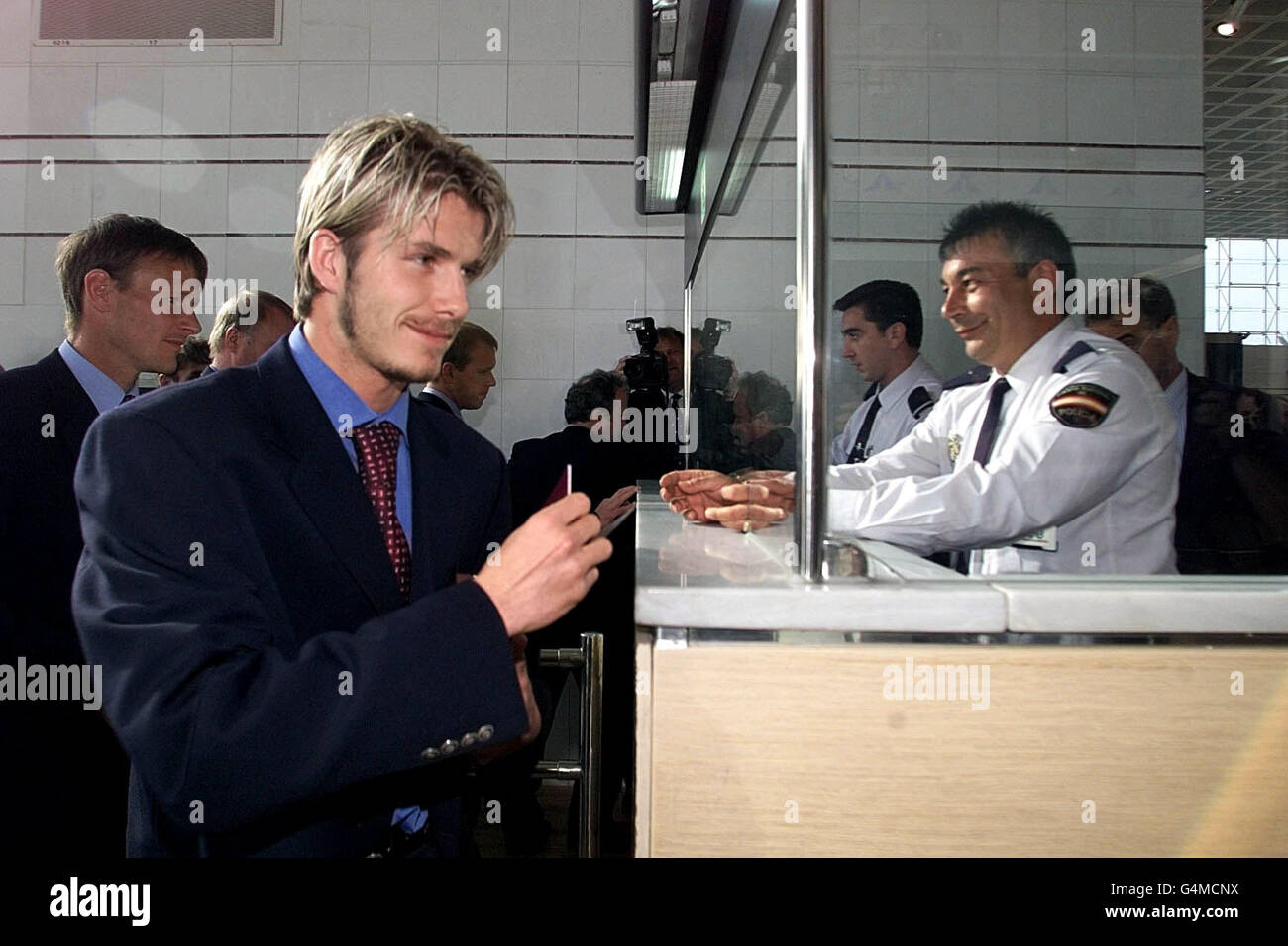 Manchester United midfielder David Beckham makes his way through passport control after his side arrived on Concorde at Barcelona prior to the European Cup final against Bayern Munich. Stock Photo