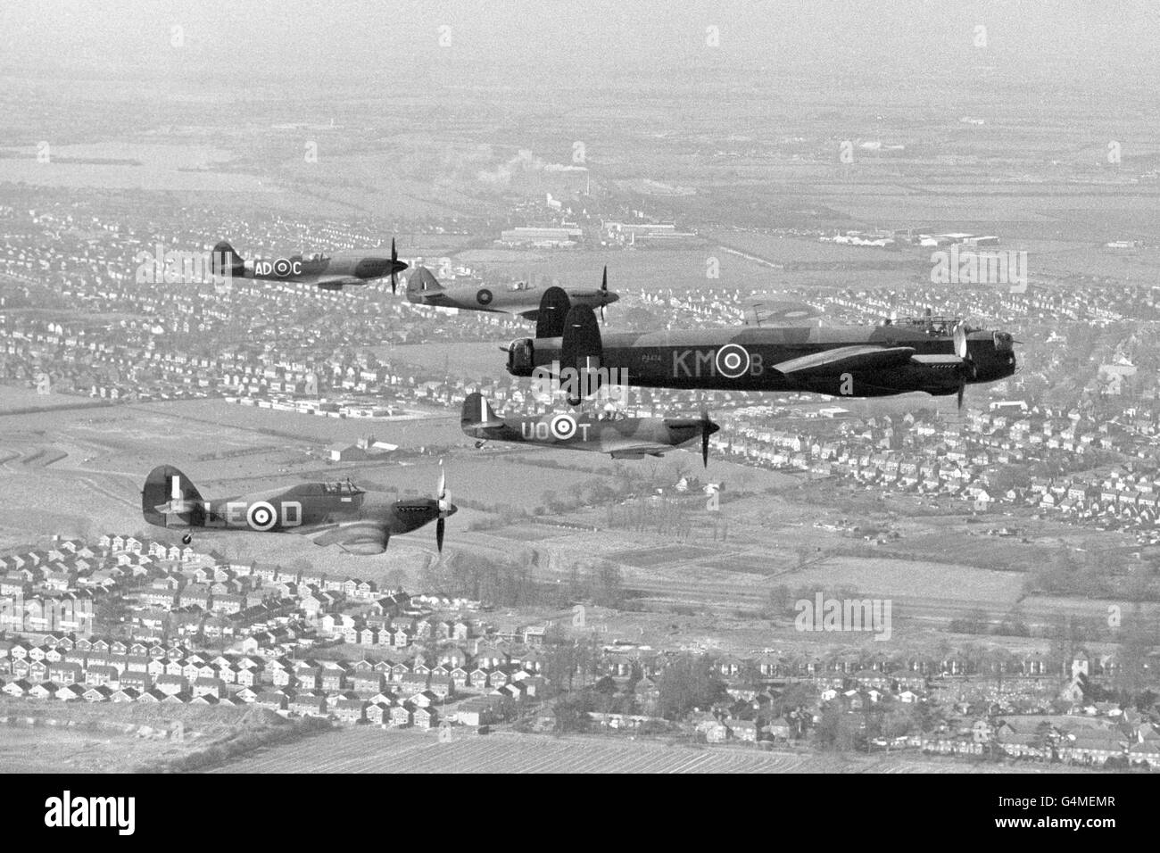 The planes of the Royal Air Force's famous 'Battle of Britain Memorial Flight' during their move from RAF Coltishall to RAF Coningsby. The Three Spitfires and a Hurricane are lead by a Lancaster on route to their new home after Coltishall became the new base for the Jaguar ground attack aircraft Stock Photo