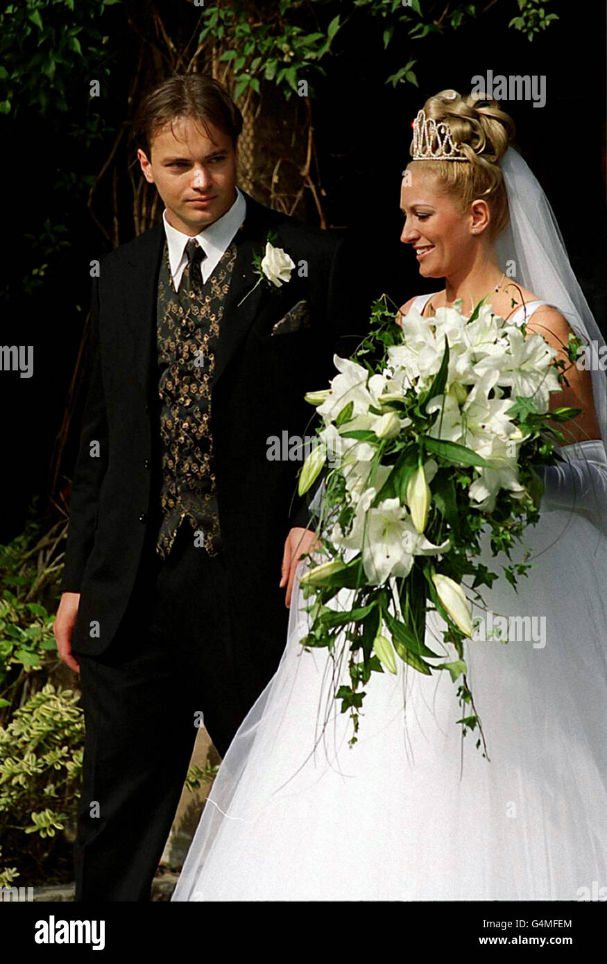Manchester United goalkeeper Mark Bosnich and his bride Sarah Jarrett after their marraige at Coombe Abbey Hotel, near Coventry. Earlier in the day Mark was released from police custody after being arrested on suspicion of robbery. * ALleged inciedent occured outside Legs Eleven Nightclub in Birmingham, while he was out celebrating his stag night. 29/10/2003: Former soccer star Mark Bosnich, 31, who was arrested after an alleged assault on his ex-girlfriend Sophie Anderton, following an incident in Knightsbridge, west London, last night. He was taken to Notting Hill police station where he Stock Photo