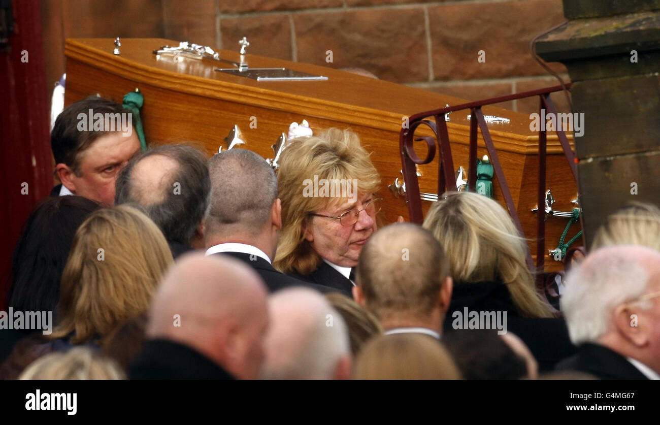 The coffin of Bridget Sharkey is carried out of St Joseph's Church in Helensburgh after her funeral. Stock Photo