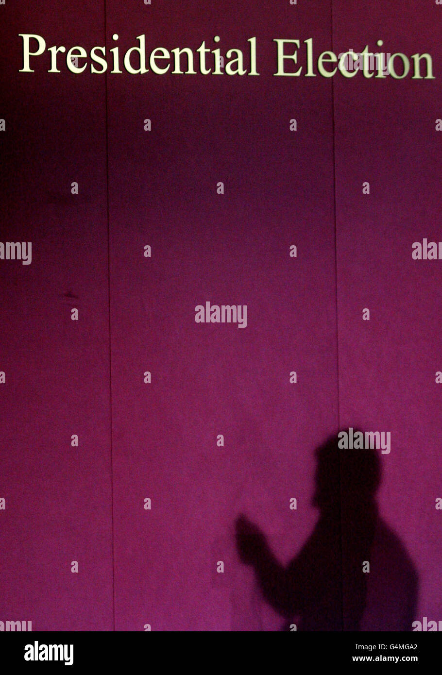 A lighting engineer on the podium at Dublin Castle as preparations are made for the counting of votes in the Presidential Election. Stock Photo