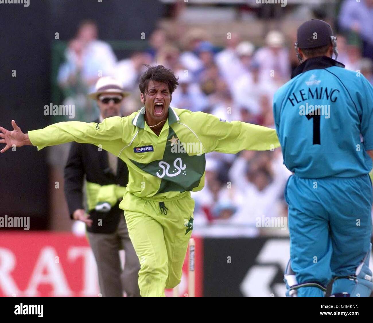 Shoaib Akhtar of Pakistan shows his joy at taking the wicket of New Zealand captain Stephen Fleming in their 1999 World Cup cricket semi-final match at Old Trafford in Manchester. Stock Photo