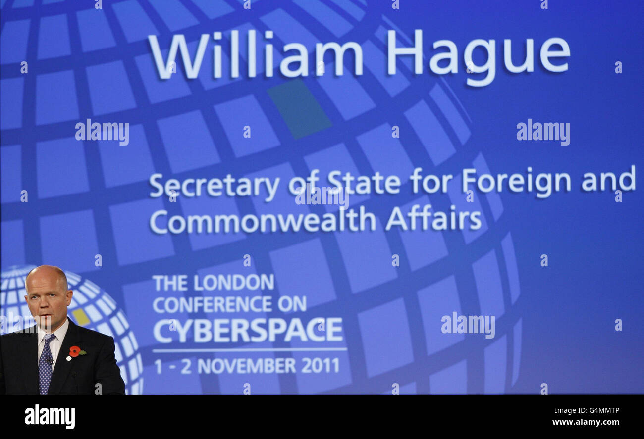 Foreign Secretary William Hague makes a keynote speech at the opening session at the London Cyberspace Conference at Queen Elizabeth II Conference Centre in Westminster. Stock Photo