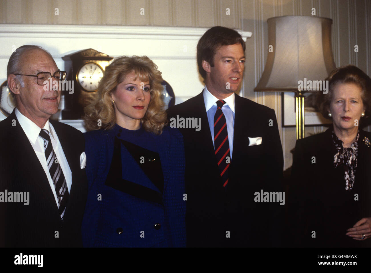 Prime Minister Margaret Thatcher (far right) with husband Denis (far left) and son Mark (second from right) who has announced his engagement to Texan Miss Diane Burgdorf (next to Denis) who is the daughter of American millionaire car dealer Theodore C. Burgdorf. Stock Photo