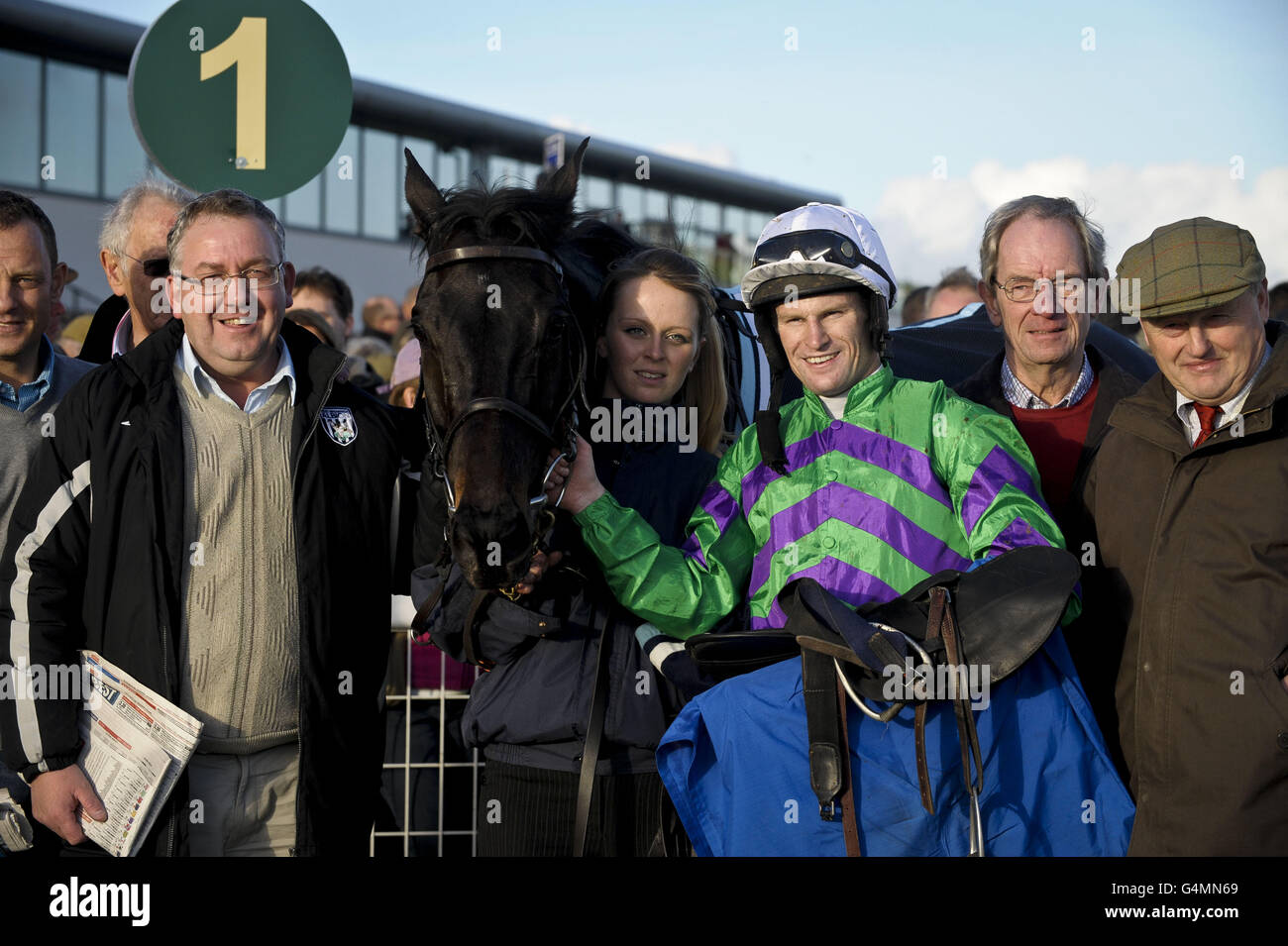 Andrew Glassonbury with Shammick Boy in the winners enclosure after winning the Betfred Goals