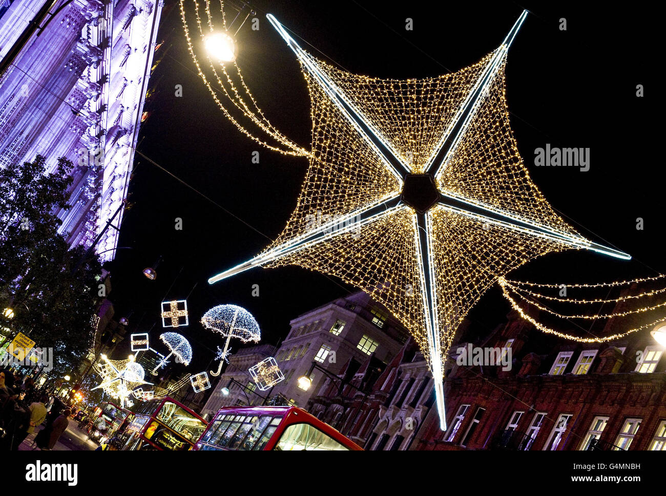 The Saturdays switch on Oxford Street Christmas lights London Stock