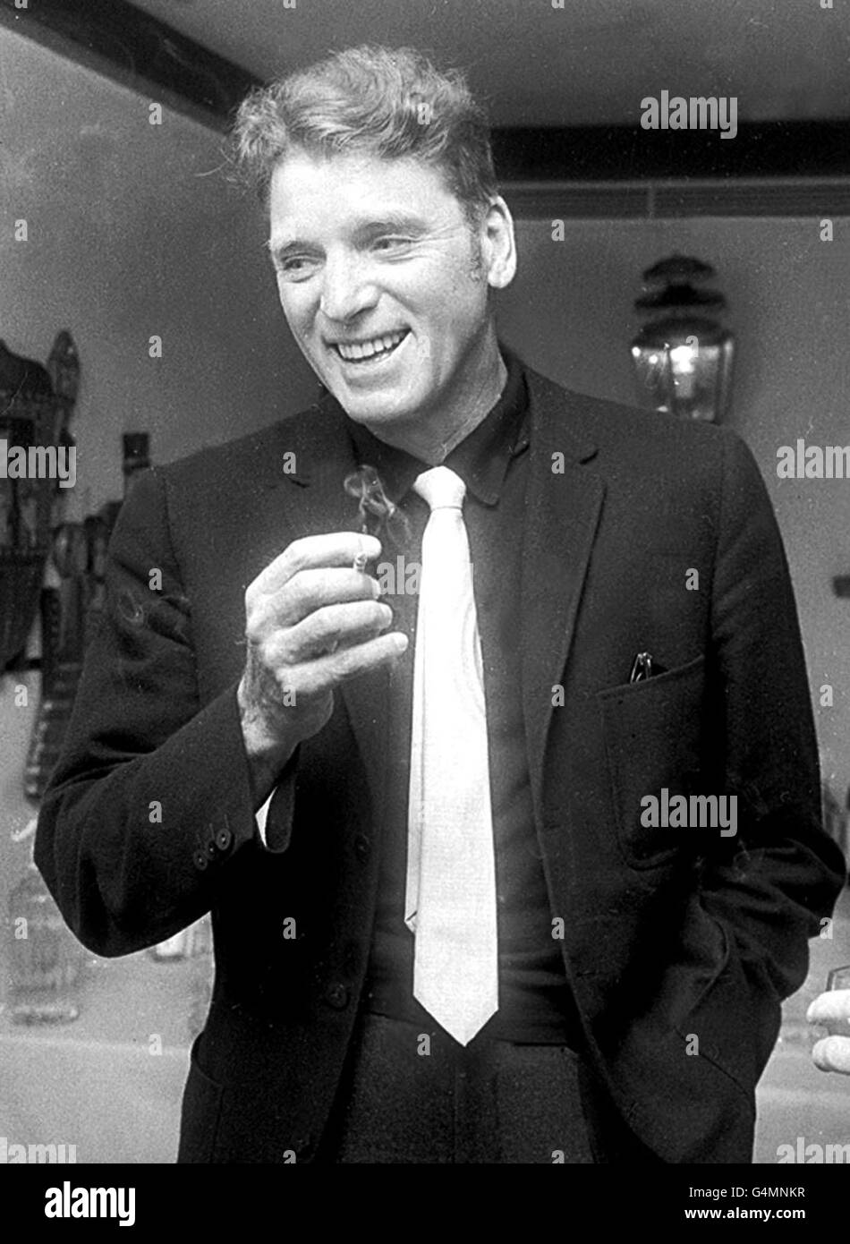 Burt Lancaster in London on a one-day visit to meet Sir Laurence Olivier to discuss their forthcoming film together, 'Khartoum'. Stock Photo