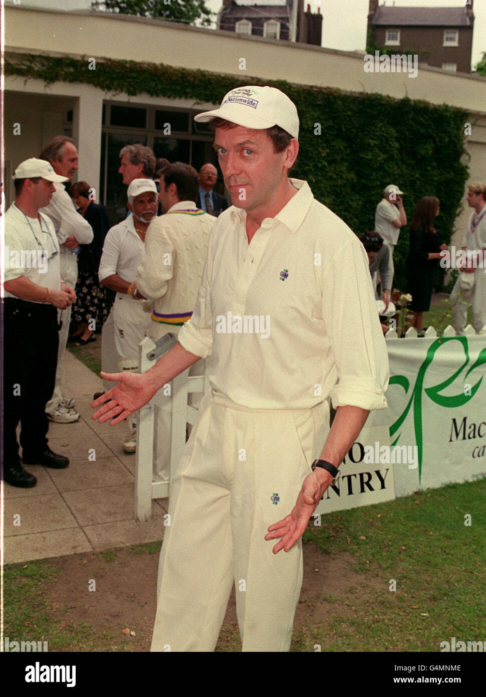 Comedian and television actor Hugh Laurie at the annual Macmillan Garter charity cricket match, in which Laurie's Cowboys XI and Deryck Murray's Macmillan XI play for the Honour of the Garter. Stock Photo