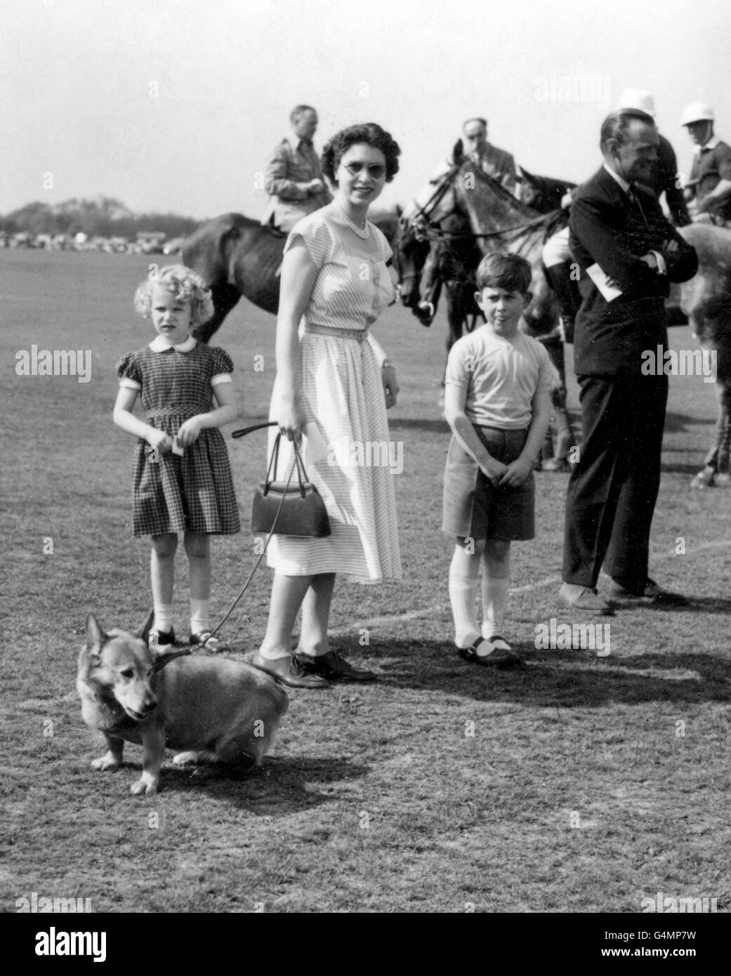 Queen Elizabeth II with Prince Charles and Princess Anne at Smith's Lawn, Windsor Great Park, where they watched the Duke of Edinburgh play polo for the Welsh Guards. Stock Photo