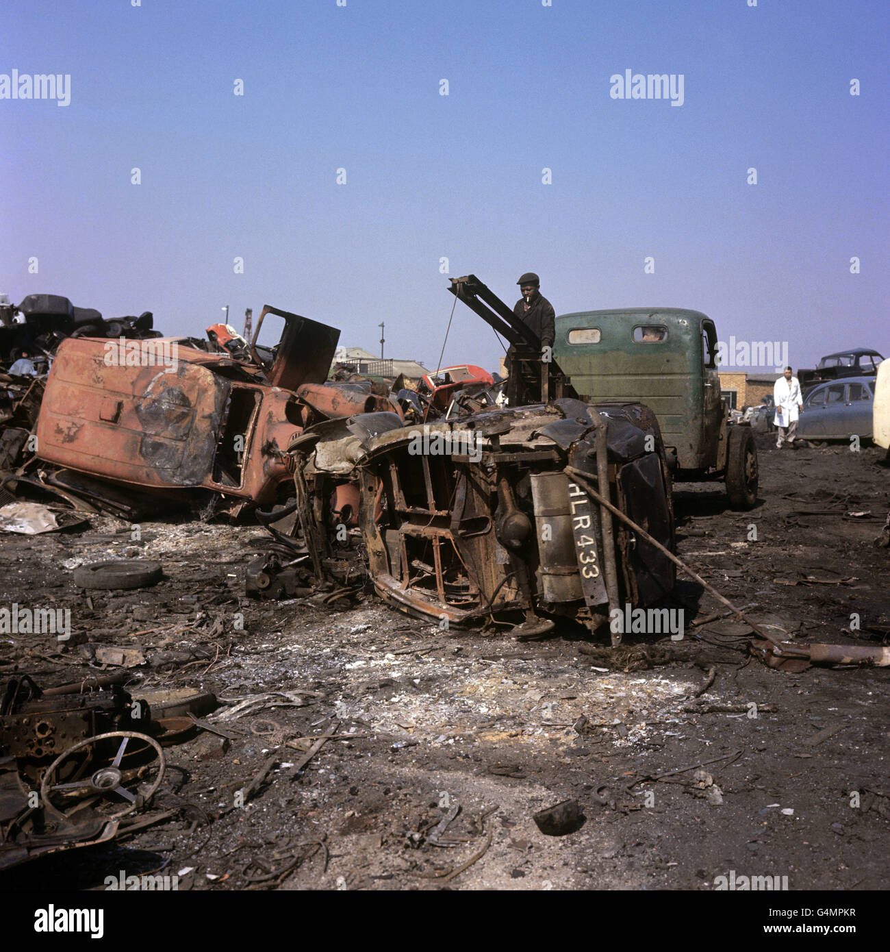 Motoring - Scrapped Cars Feature - Waltham Cross, Hertfordshire. Scrapped cars waiting to be crushed at Waltham Cross scrap yard, Hertfordshire Stock Photo
