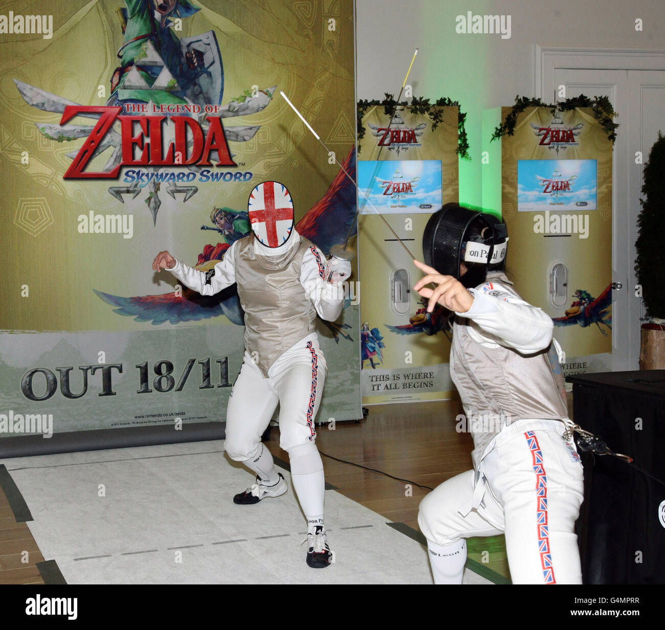 Claire Bennett (left) and Liz Ng of the Senior British Fencing team spar  against each other at the launch of the new Legend of Zelda Skyward Sword  video game for the Nintendo