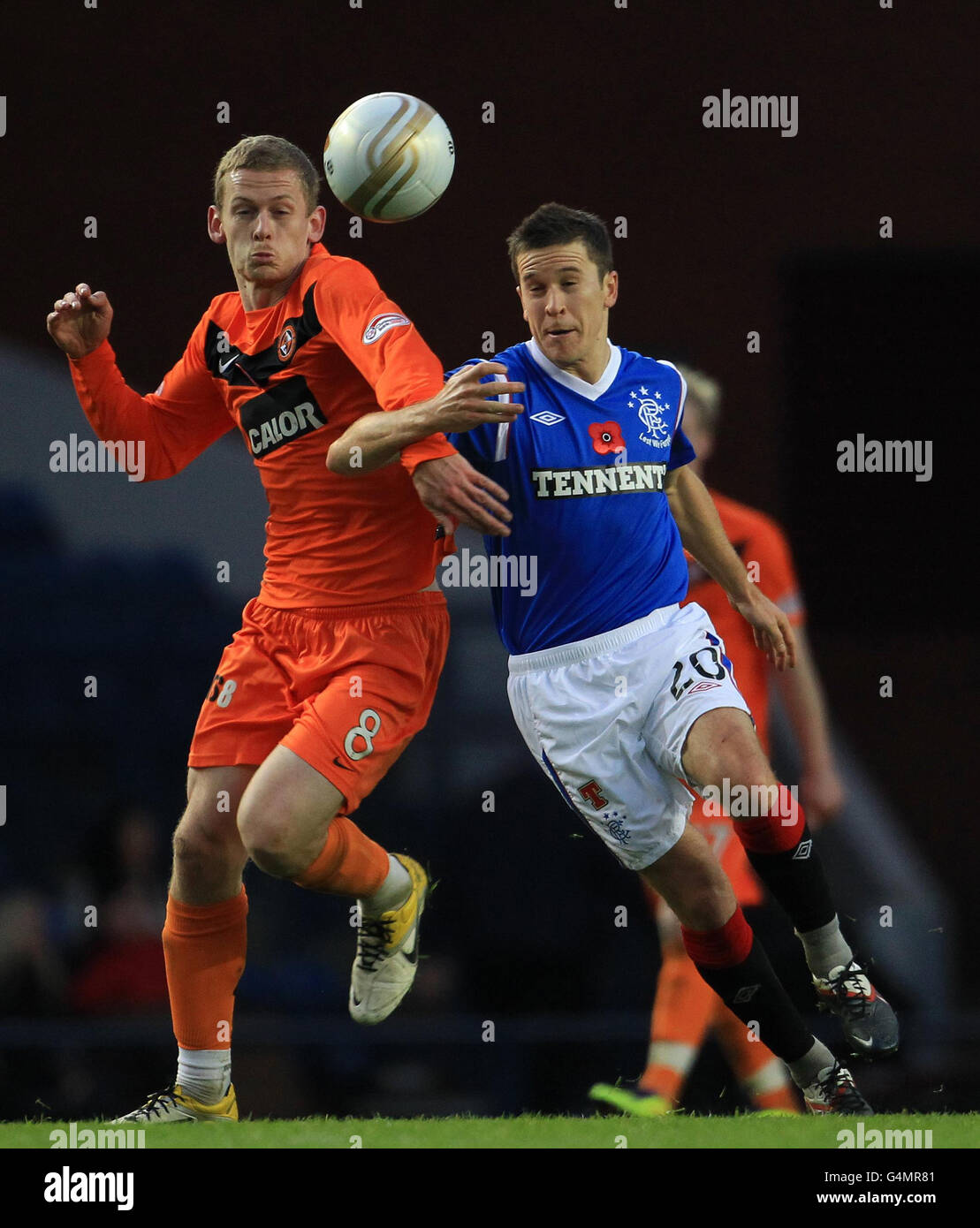 Rangers' Matt McKay and Dundee United's Scott Robertson (left) during the Clydesdale Bank Scottish Premier League match at Ibrox Stadium, Glasgow. Stock Photo
