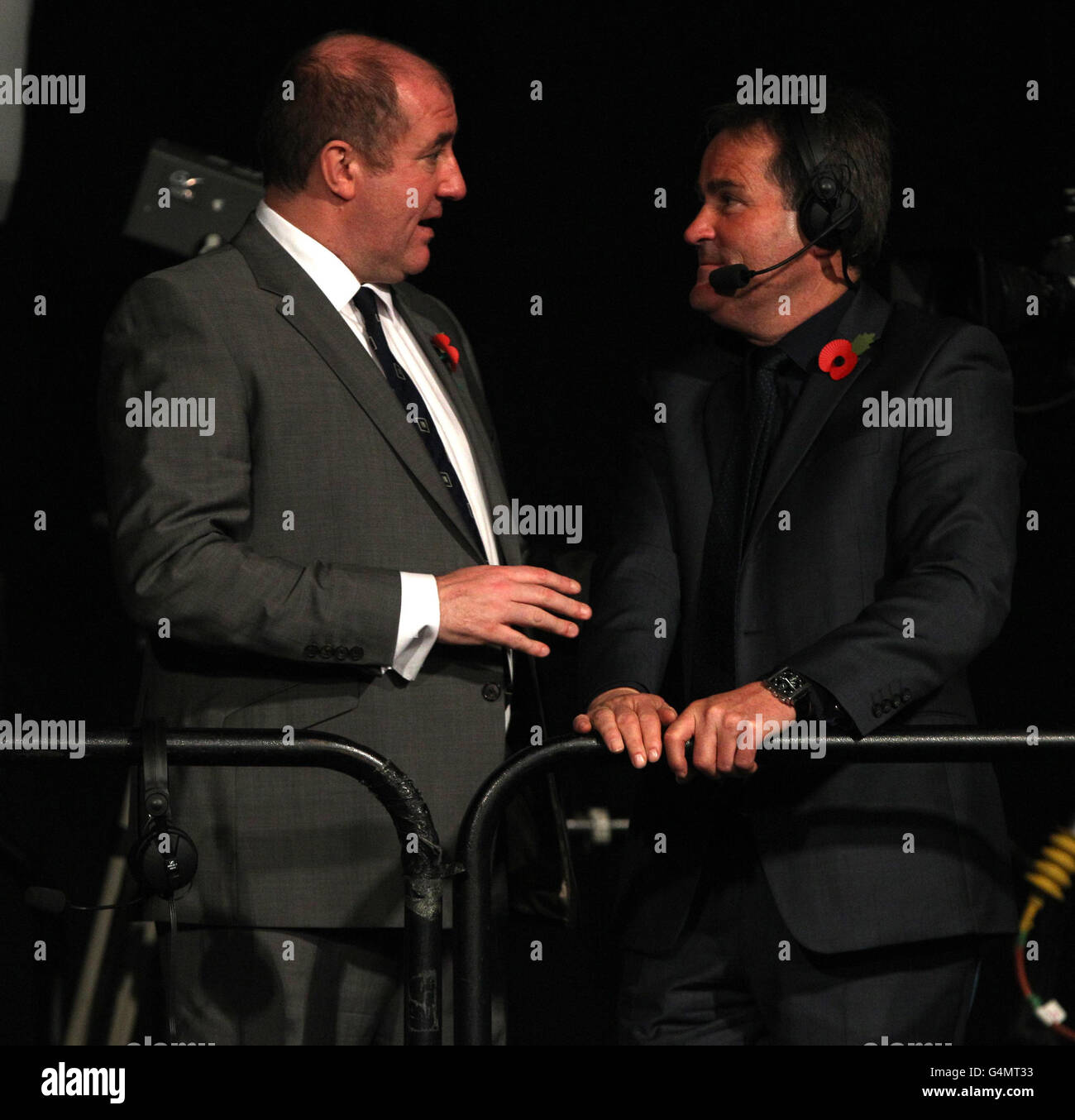 Boxing Pundit Steve Bunce talks with Box Nation Presenter Richard Keys prior to the WBO Interim Lightweight Title fight at Wembley Arena, London. Stock Photo