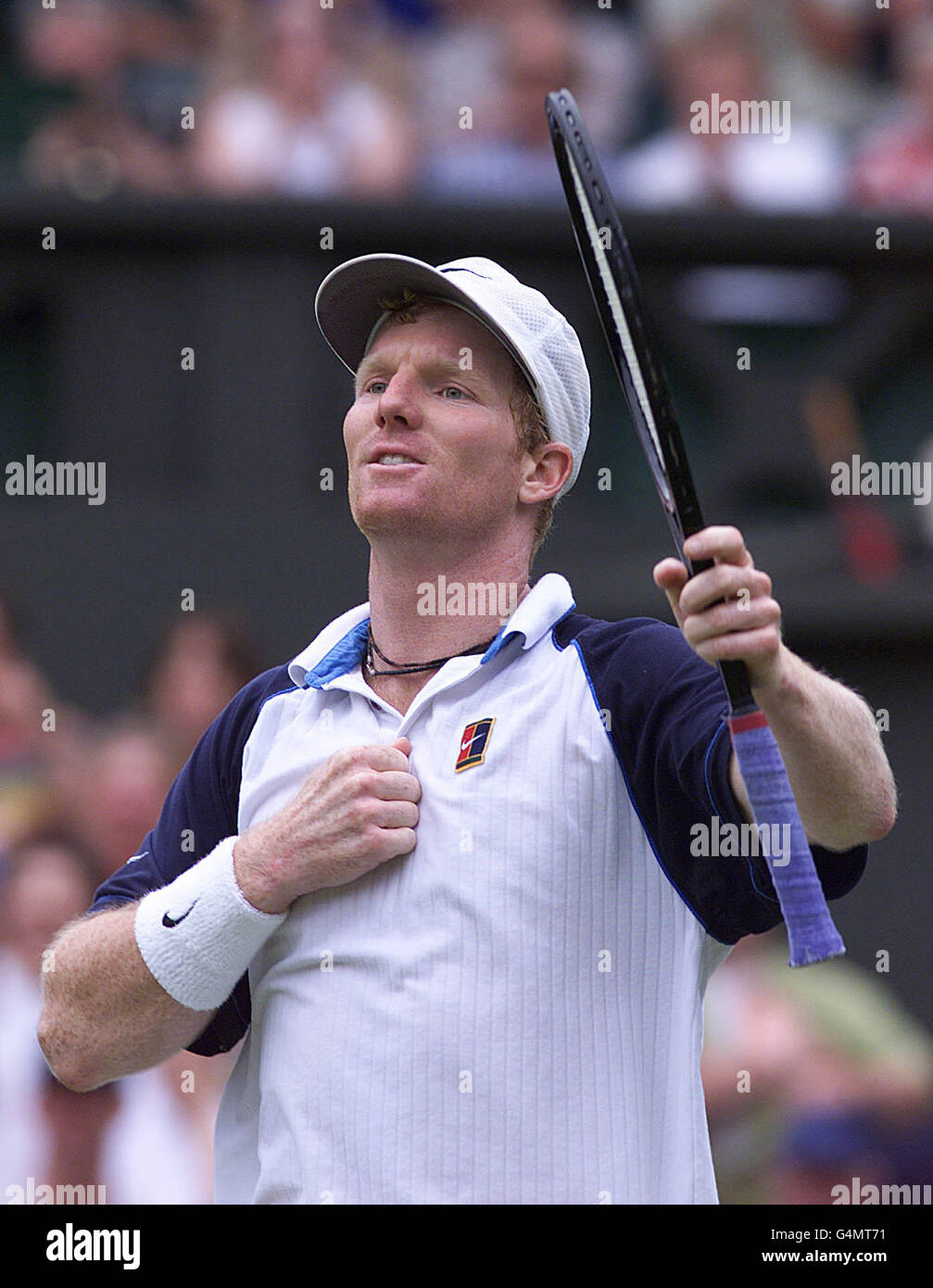 No Commercial Use. America's Jim Courier celebrates his victory over Spain's Carlos Moya at WImbledon. Stock Photo