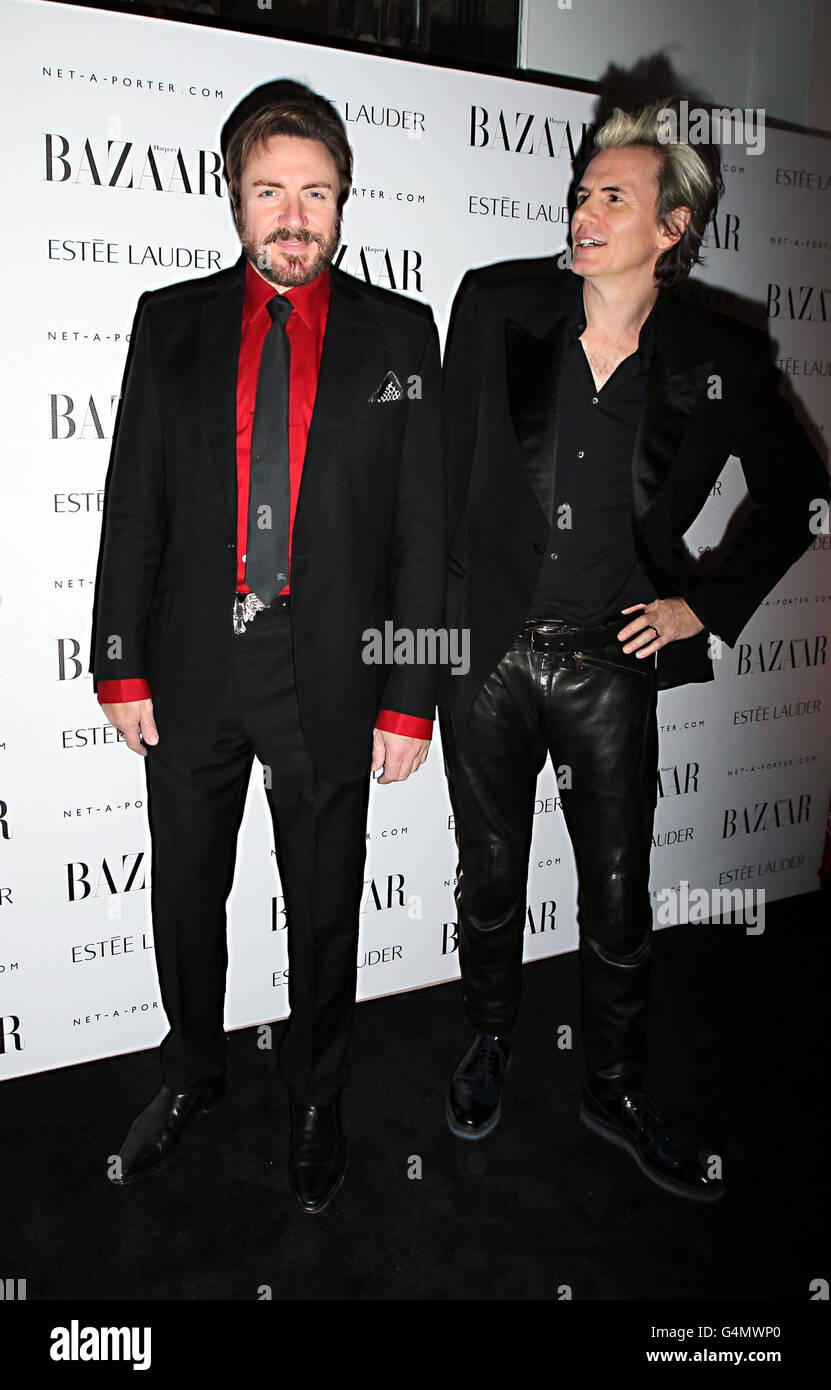 Simon Le Bon (left) and John Taylor of Duran Duran arrive at the Harpers Bazaar Women of the Year Awards at Claridges Hotel in central London. Stock Photo