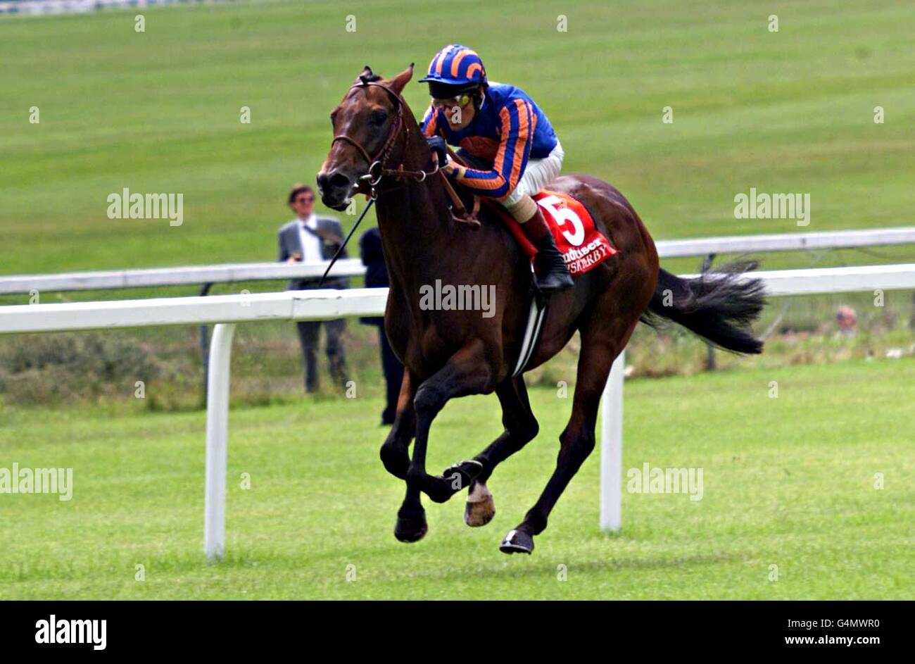 Jockey Cash Asmussen, riding Montjeu, comes home to win the Irish Derby