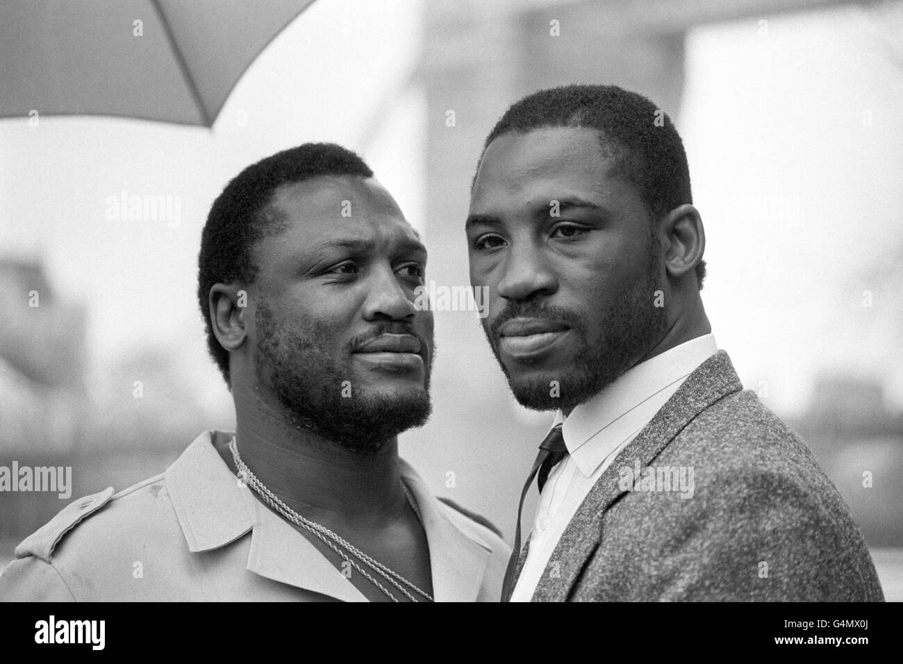'Smokin' Joe Frazier, left, former world heavyweight boxing champion, in London with his boxer son, Marvis, due to fight Funso Banjo at Alexandra Palace. Stock Photo