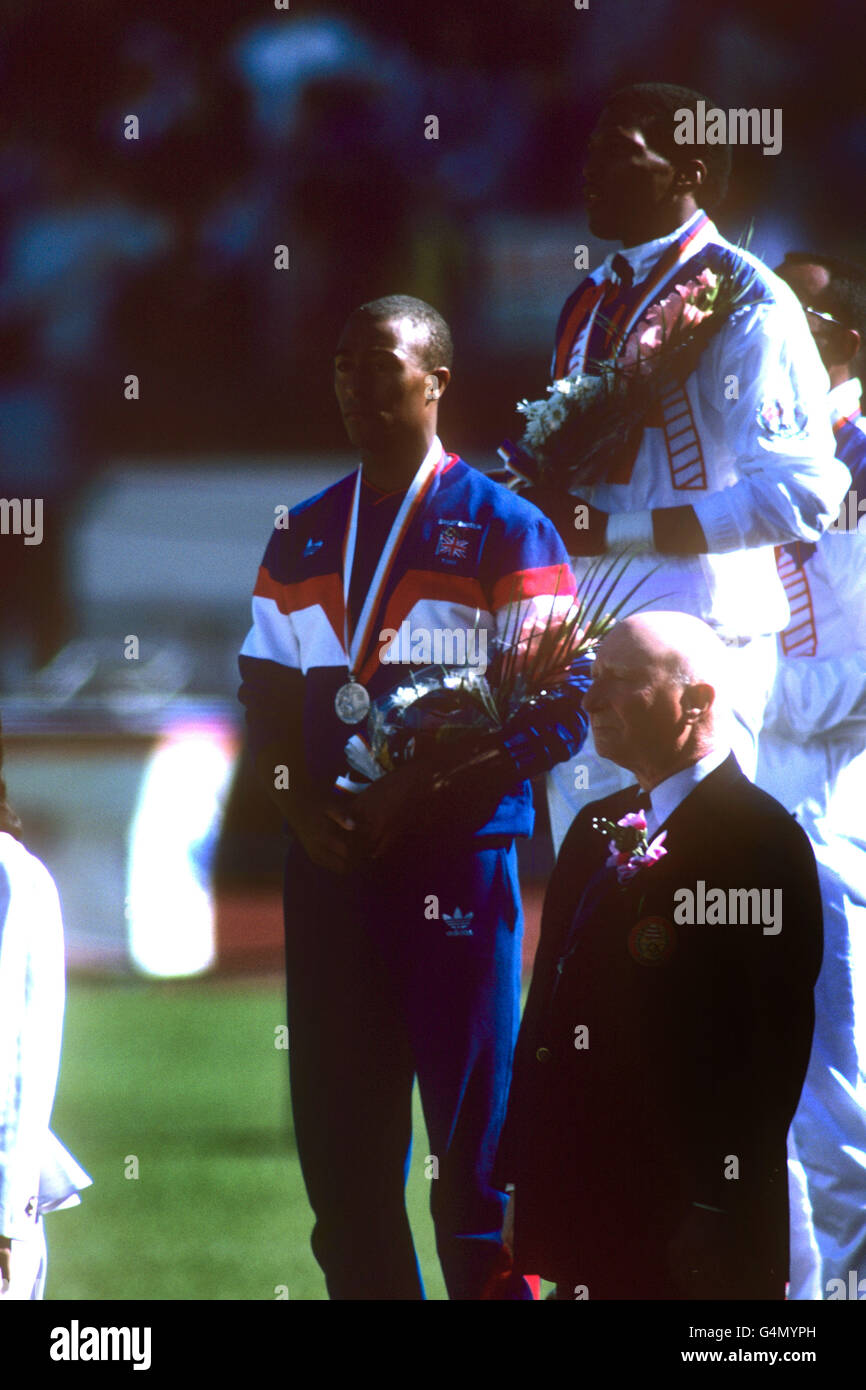 (l-r) Colin Jackson (Great Britain), Silver medal, Roger Kingdom (United States), Gold Medal and Tonie Campbell (United States), Bronze medal (hidden). Stock Photo