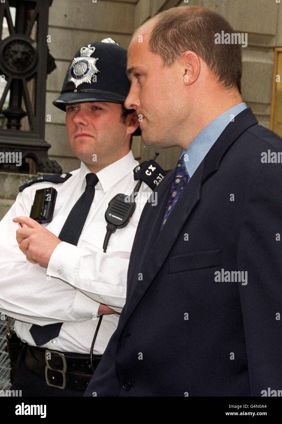 PC Christopher Sherwood (right), 32, leaving Bow Street magistrates court in central London, where he and four other officers (not shown) face misconduct charges over their handling of a raid in St Leonard s, East Sussex. Stock Photo