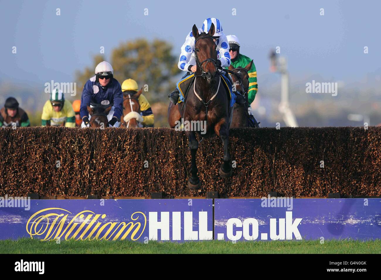 Power Pack Jack (centre) ridden by Sam TwistonDavies jumps the last