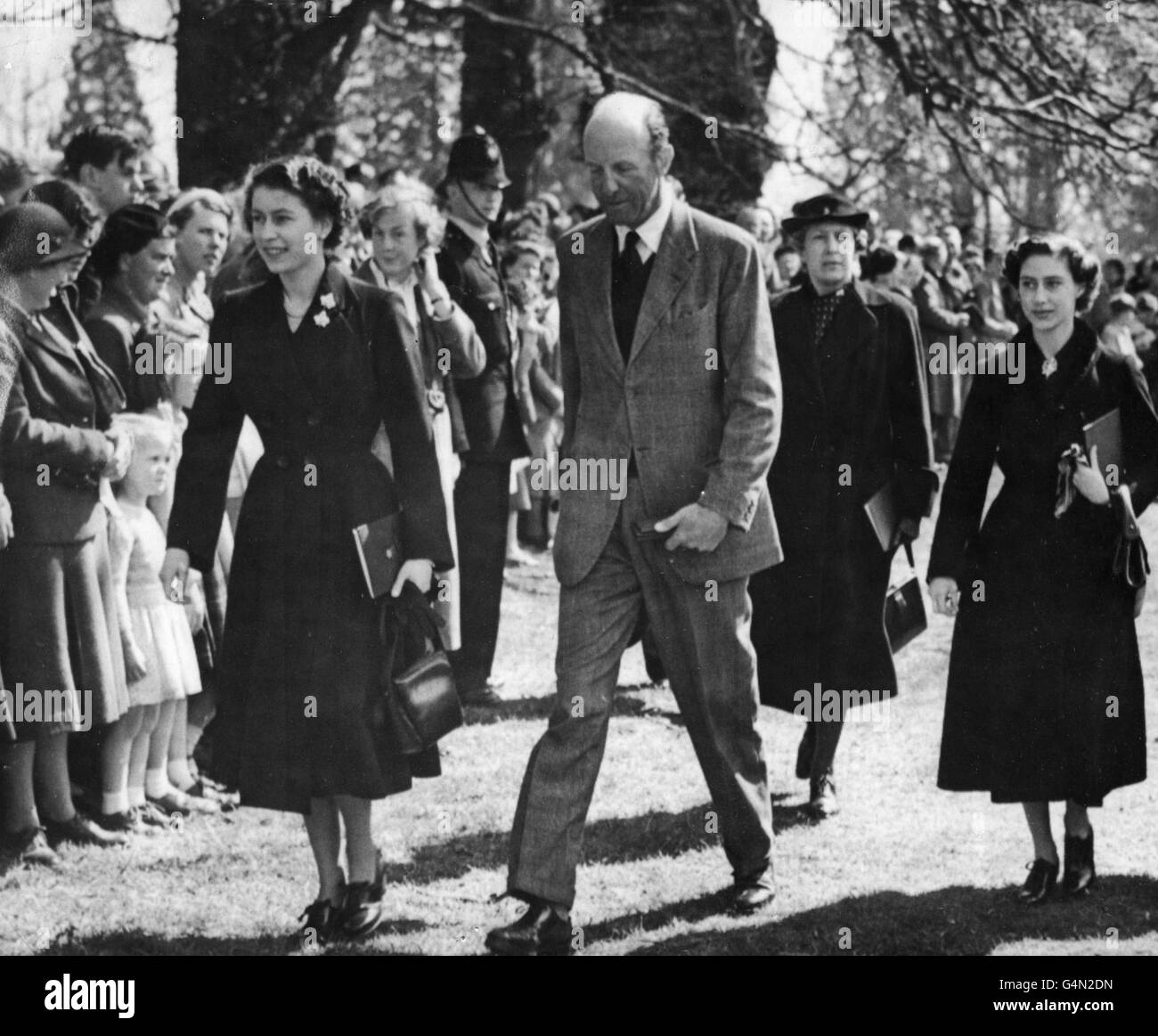 *Scanned off print* Queen Elizabeth II and her sister Princess Margaret, with the Duke of Beaufort when they arrived at Badminton to watch the Olympic Horse Trials. Stock Photo