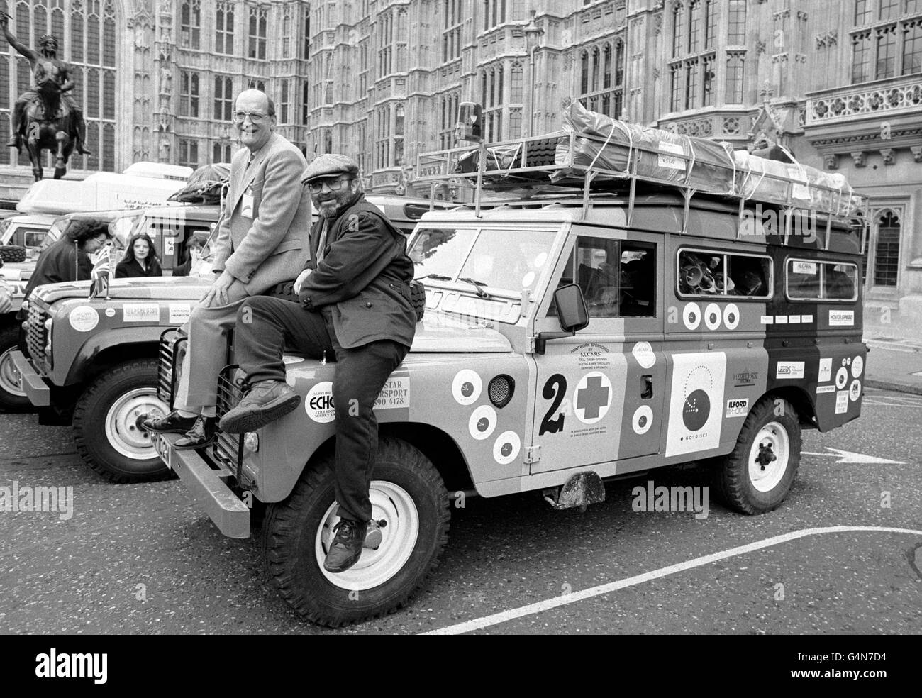 Bob Hoskins, right, and Lord Winchilsea, founder of the Saharaman Aid Trust, outside the House of Lords in London, before setting off for a long charity drive to Southern Algeria. They are amongst 40 drivers making the Journey in 15 Land Rovers and a London taxi to raise money for Saharawi refugees living in camps since their land was annexed by Morocco 13 years previously. Stock Photo