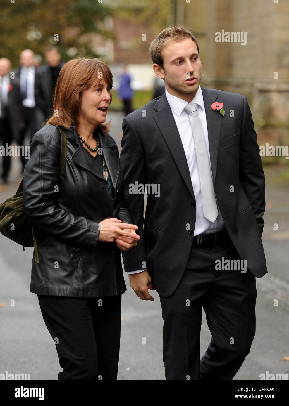 Worcester Warriors player and Graham Dilley's son, Chris Pennell (right) arrives for the thanksgiving service for Graham Dilley at Worcester Cathedral, Worcester. Stock Photo