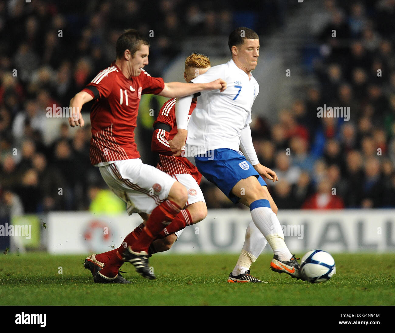 Soccer - Under 19 International Friendly - England v Denmark - AMEX Stadium. England's Ross Barkley and Denmark's Lukas Lerager (left) Stock Photo