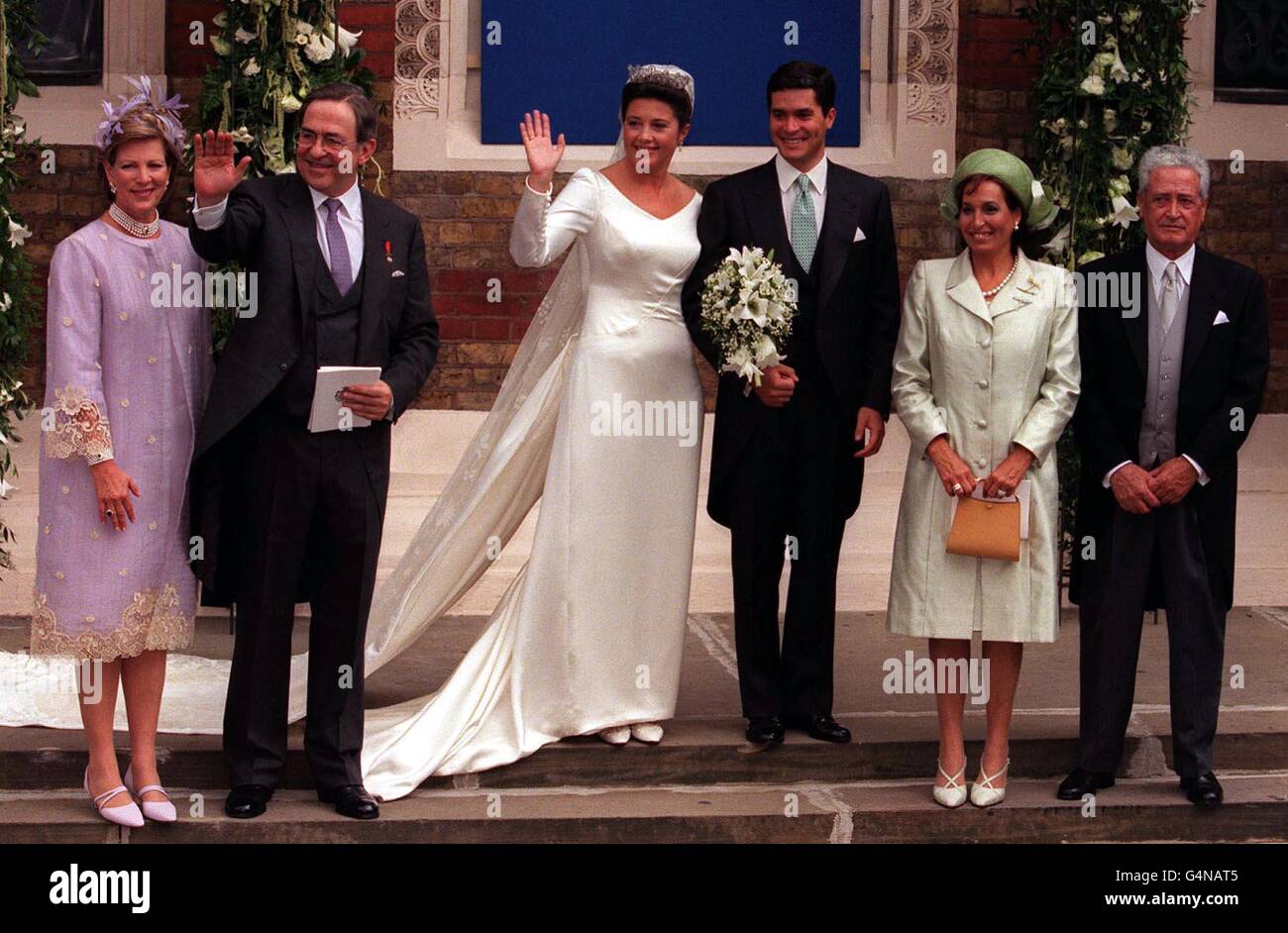 Princess Alexia of Greece and her husband Carlos Morales Quintana of Spain (centre) with (left) her parents to the left, King Constantine and Queen Anne-Marie of Greece and (right) his parents, Miguel Morales Armas and Maria Teresa Quintana Gionzalez. * after the wedding at the Greek Orthodox Cathedral of St Sophia in Bayswater, West London. Stock Photo