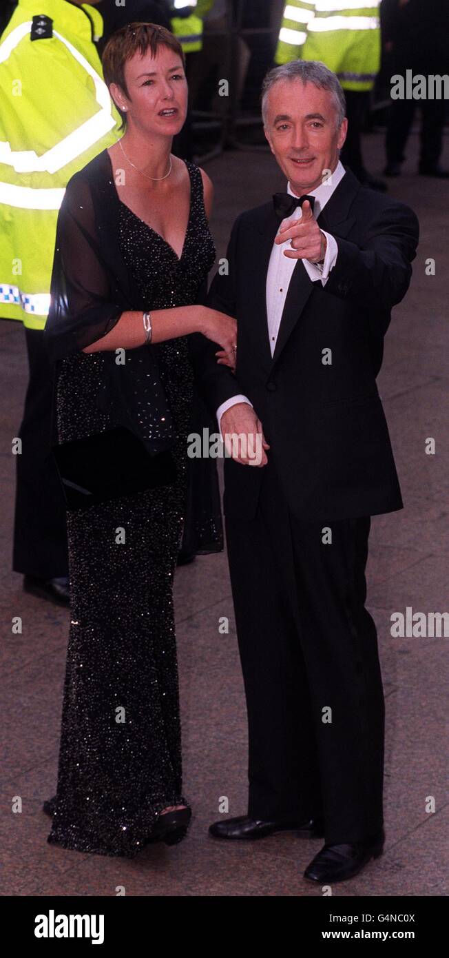 Actor Anthony Daniels (who plays C3PO) and his wife arriving for the Royal Premiere of Star Wars: Episode 1, The Phantom Menace at Leicester Square, London. Stock Photo