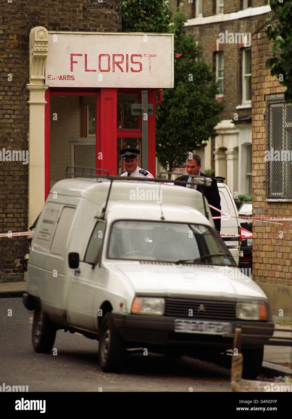 Police activity in Walworth, South East London after a motorcycle gunman shot a man in the back of a head in the second drive-by shooting in the capital in 4 days. The attack in Larcom Street, near a florist shop at 8am, left the victim fighting for his life. * and followed a similar attack on Radio 1 rap music DJ Tim Westwood on Sunday less than a mile away. Stock Photo