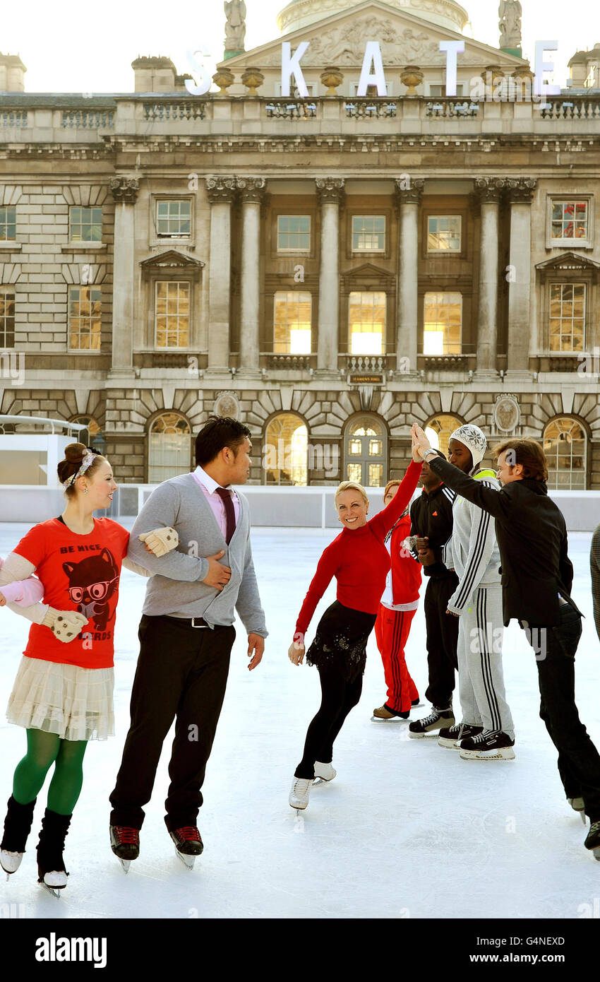 Standalone: British Olympic Ice dance champion Jayne Torvill, centre, with James Streeter, as they demonstrate a dance to the 16 members of the Somerset House Ice crew, who will guide and support skaters that visit the rink in central London over the winter opening from November 22 until January 22, 2012. Stock Photo