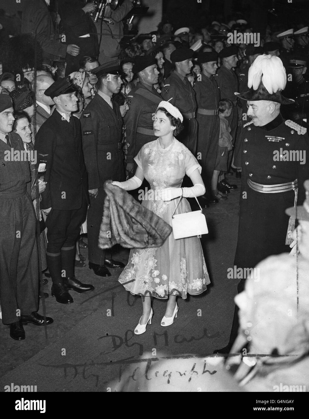 Queen Elizabeth II, escorted by Major-General J.A Gascoigne, arrives at Earl's Court, London, to attend the opening of the Royal Tournament. Stock Photo