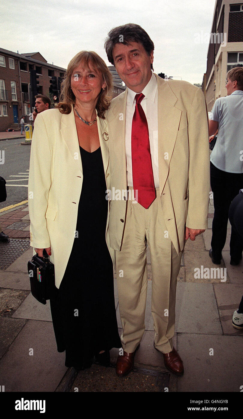 Actor Tom Conti and his wife Kara Wilson arriving at the Old Vic Theatre in London for the opening night of the Keith Waterhouse play 'Jeffrey Bernard is Unwell' Stock Photo