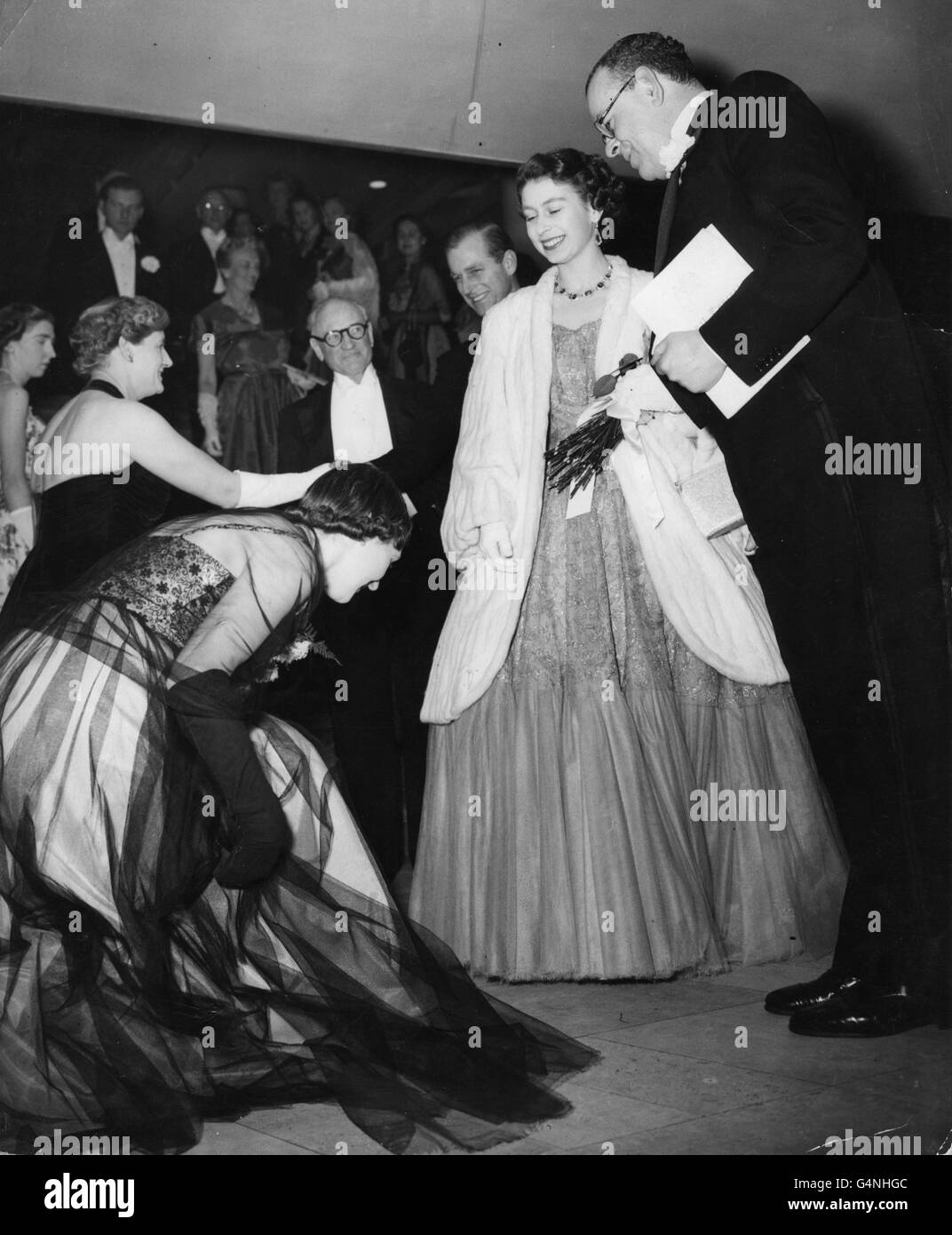 Queen Elizabeth II leaves the Festival Hall after attending the first royal concert of her reign. The concert was in aid of the Musicians' Benevolent Fund. Stock Photo