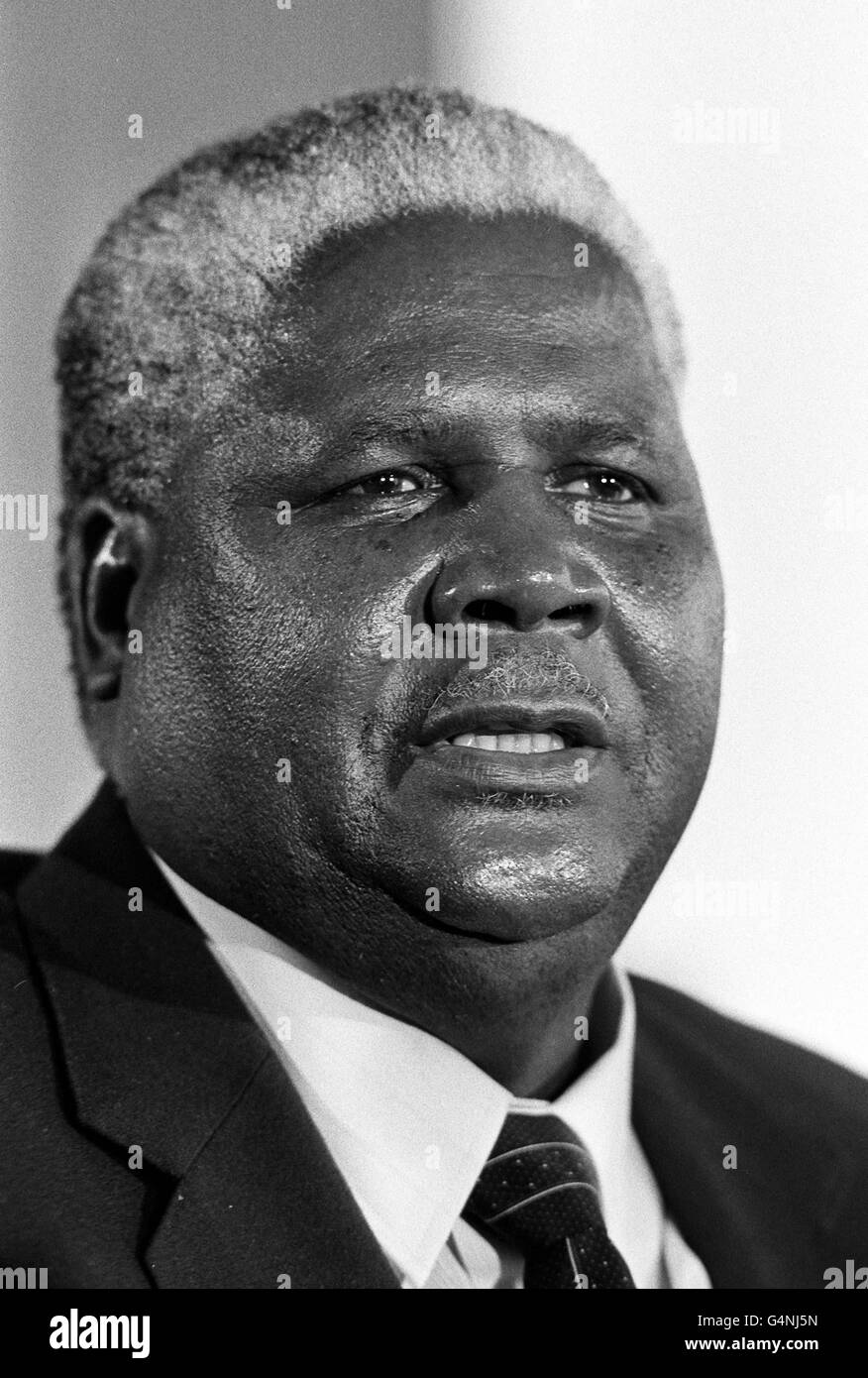 Zimbabwe Opposition leader Joshua Nkomo giving a press conference in London. 1/7/99: Joshua Nkomo, the father of Zimbabwe's fight against colonial rule in the former British colony of Rhodesia has died the government announced. He was 82. * State radio interrupted morning programmes to play the national anthem and liberation songs, and air a tribute by President Robert Mugabe. Vice President Nkomo had suffered from prostate cancer and undergone treatment in South Africa and Egypt since 1996. Stock Photo